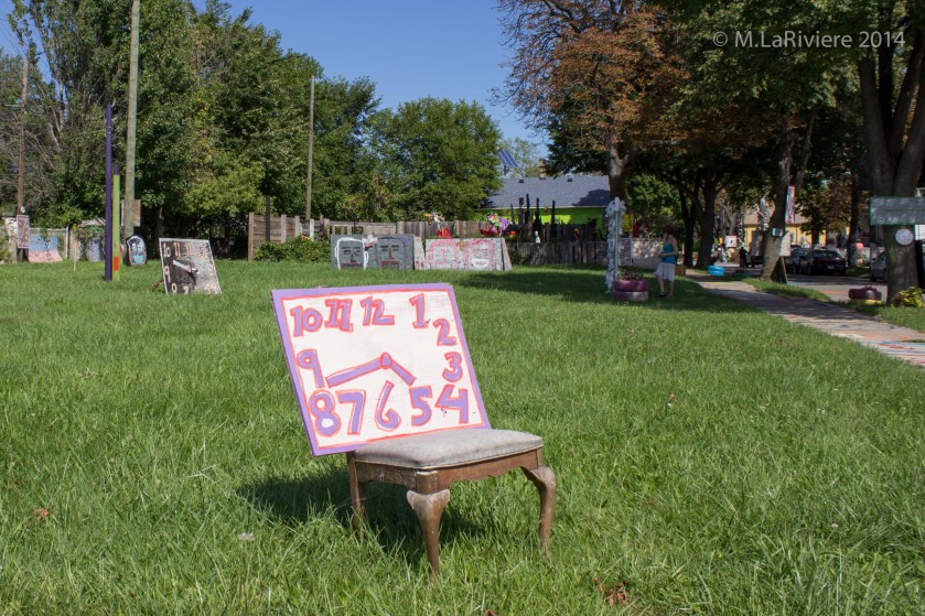 Clocks and other installations on an empty lot on Heidelberg Street